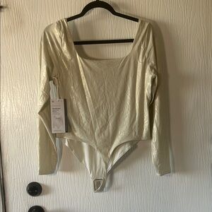 Lululemon Athletica Shimmering Cream Bodysuit